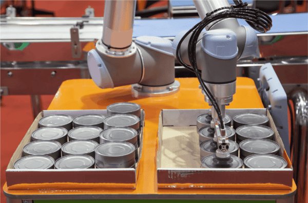 UR cobot performing high-volume automated pick and place of canned goods from a tray, integrated with AccuPick AI vision software for precise handling in food and beverage packaging.