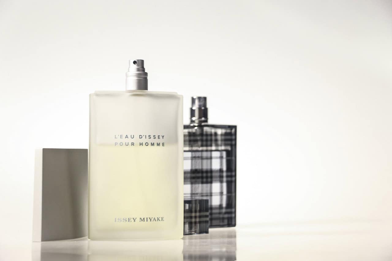 High-quality fragrance and cosmetic bottles, symbolizing the precision required in cosmetics manufacturing.